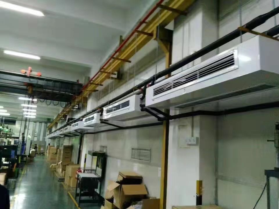 Aire acondicionado y enfriamiento en taller textil